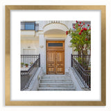 Textured art print of an abstract door design in muted gold and brown tones, framed with mat, ideal for bedroom decor.