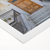 Art deco poster featuring a geometric door design in black and gold on a rolled canvas, suitable for dining room decor.