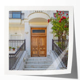 Extra large rolled print of a detailed floral design on a door, in muted earthy tones, ideal for dining room wall art.