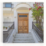 Black and white photo of an ornate door on stretched canvas, ideal for kitchen wall art.