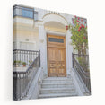 Large art print of architectural doors in muted earth tones on stretched canvas, suitable for kitchen wall decor.