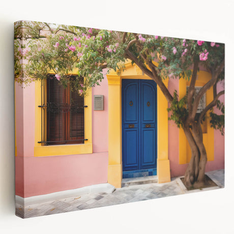 Side view of a large stretched canvas depicting a detailed architectural door design in neutral tones.