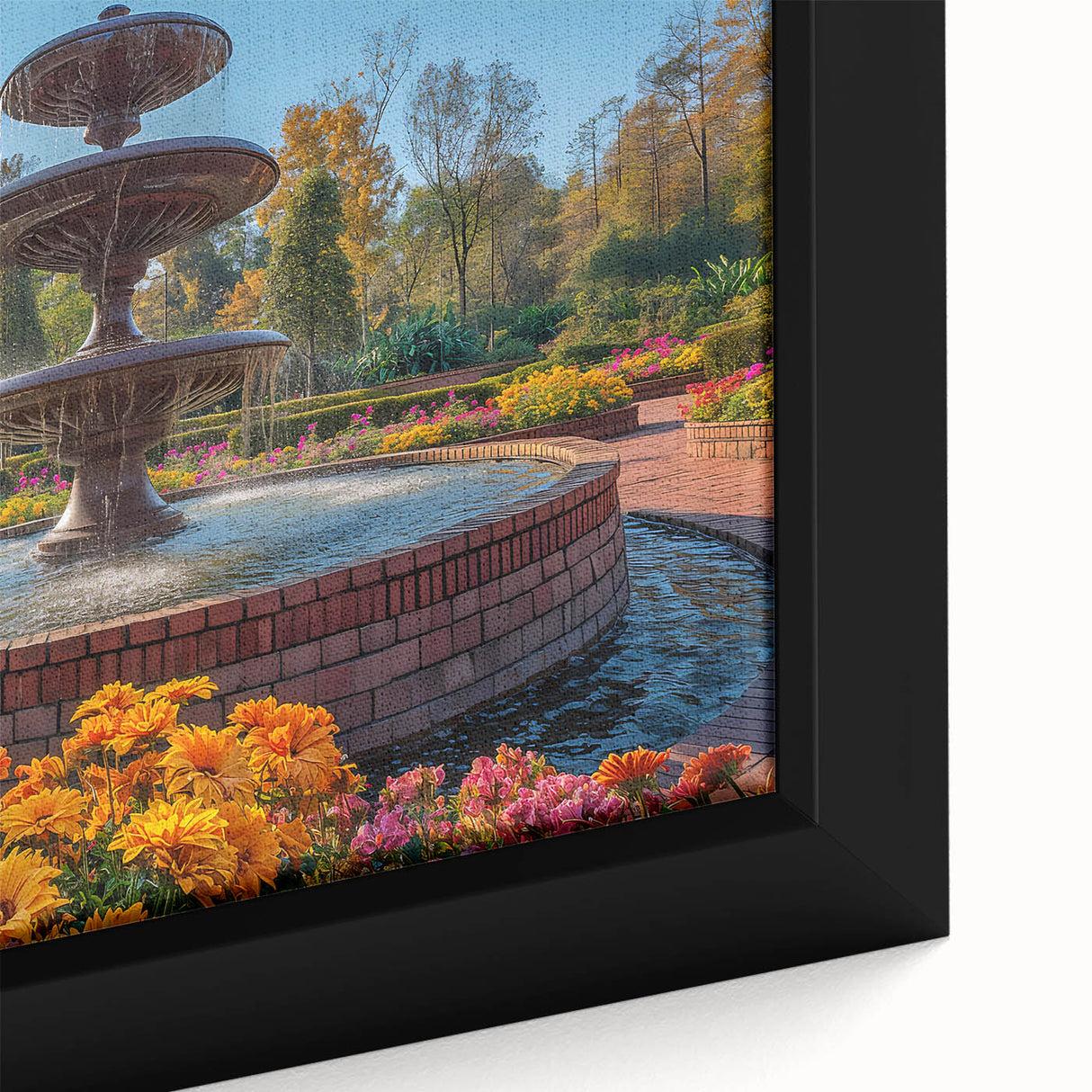 Close-up of a black framed canvas featuring a colorful, textured depiction of an architectural fountain.
