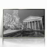 Mid-century modernist art featuring a silver-framed acrylic print of an architectural fountain design in muted tones.