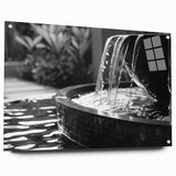 Acrylic print of large abstract wall art featuring architectural and fountain designs in muted metallic tones.