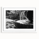 Abstract art print featuring a complex fountain design in neutral tones, framed with a white mat.