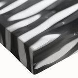 Close-up of a black and white stretched canvas featuring a large architectural fountain design, ideal for bedroom wall decor.