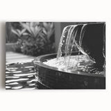 Black and white stretched canvas of a fountain design, suitable for kitchen wall art.