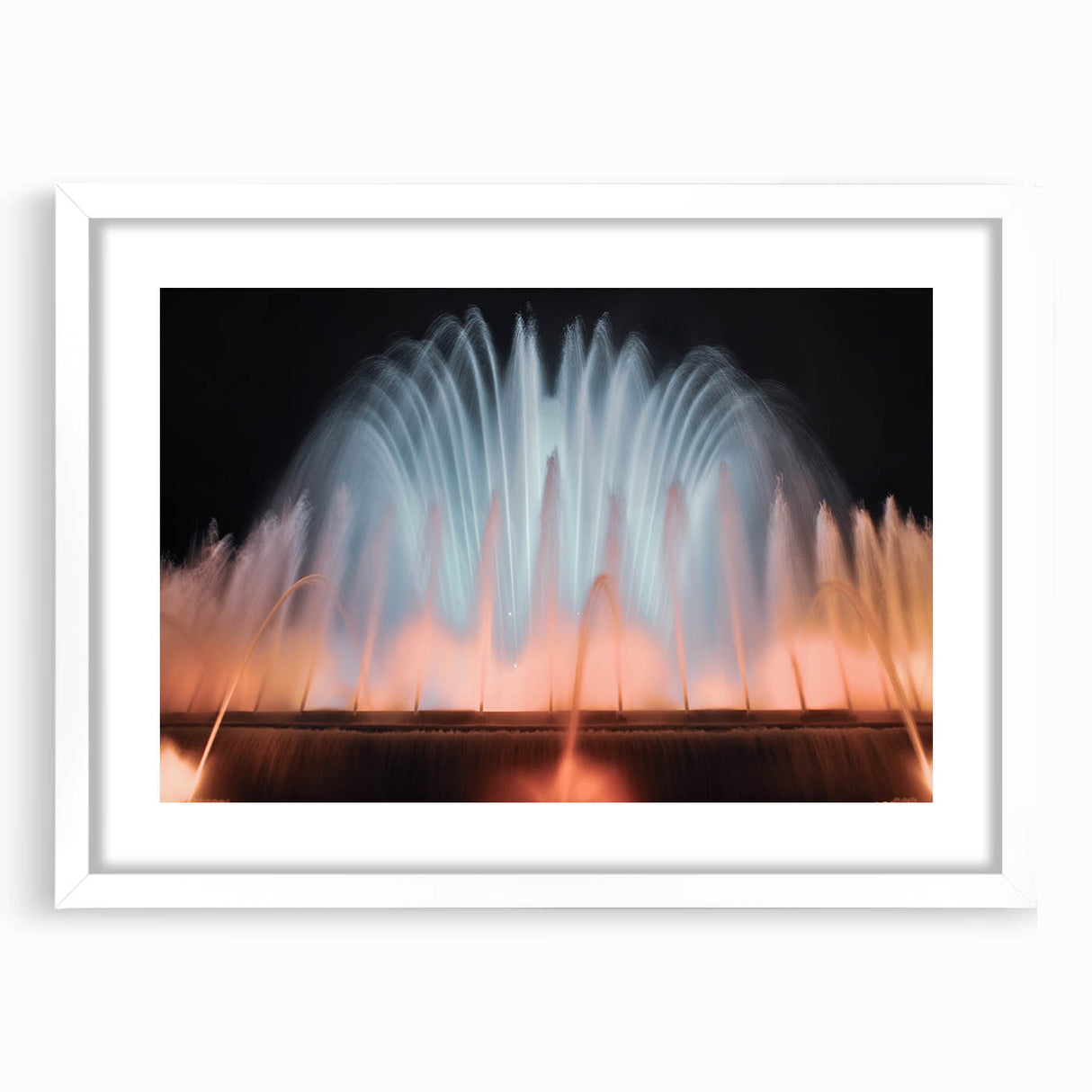 Abstract art print featuring geometric shapes in muted gray and blue tones, framed with a white mat.