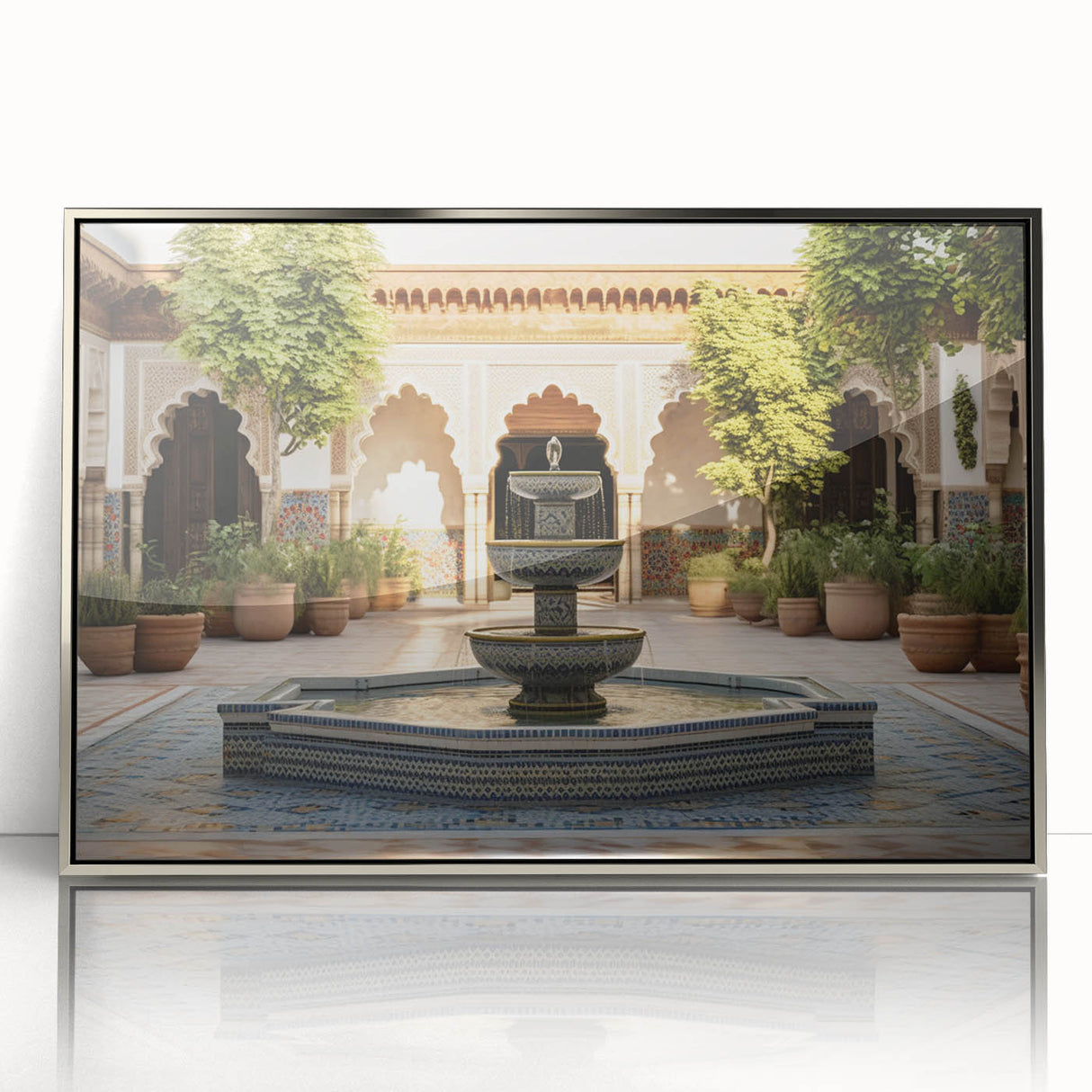 Mid-century modernist art of a silver-framed acrylic print featuring a geometric fountain design in grayscale.