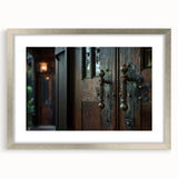 Abstract art print featuring swirling blue and gray tones on a framed canvas, suited for modern dining room decor.