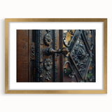 Textured abstract art print in muted gold and white, framed in gold, ideal for bedroom wall decor.