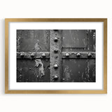Textured abstract art print in gold and white tones, framed in gold, ideal for bedroom wall decor.