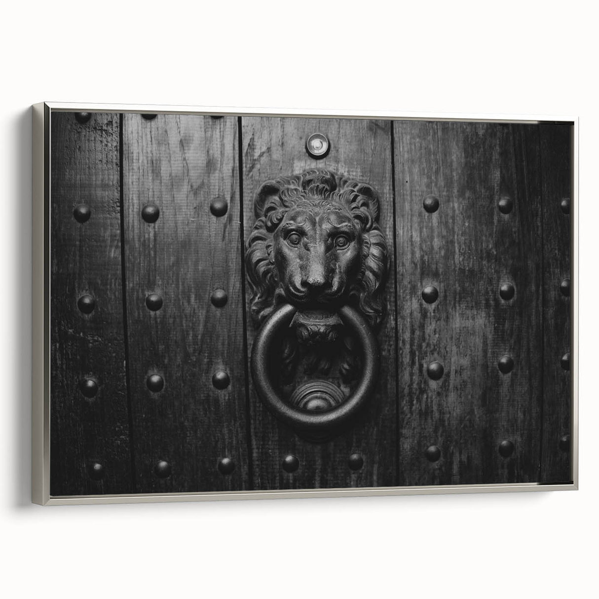Framed canvas featuring a vintage poster art of architectural hardware in black with colorful accents.