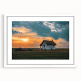 Abstract art print featuring geometric shapes in muted gray and blue tones on a framed white canvas.