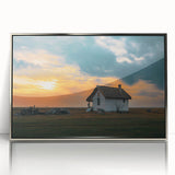 Mid-century modernist art depicting geometric houses in muted earth tones on a silver-framed acrylic print.