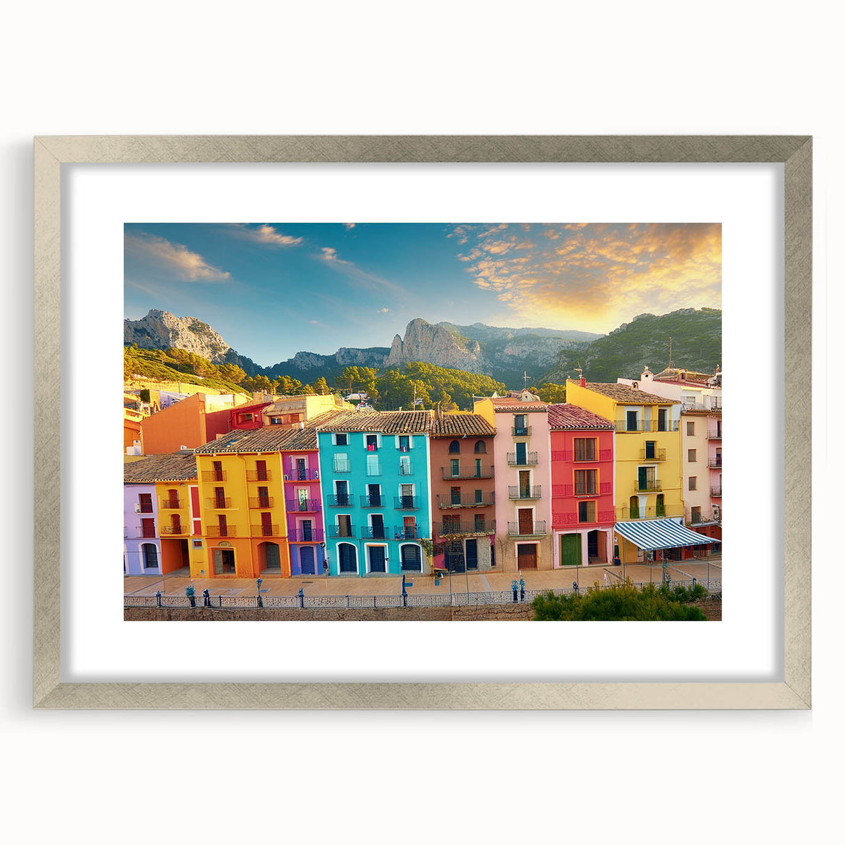 Textured abstract art print of architectural houses in muted earth tones on a framed silver mat, ideal for bedroom art.