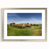 Abstract textured art print featuring geometric shapes in muted gray and blue tones on framed silver canvas.