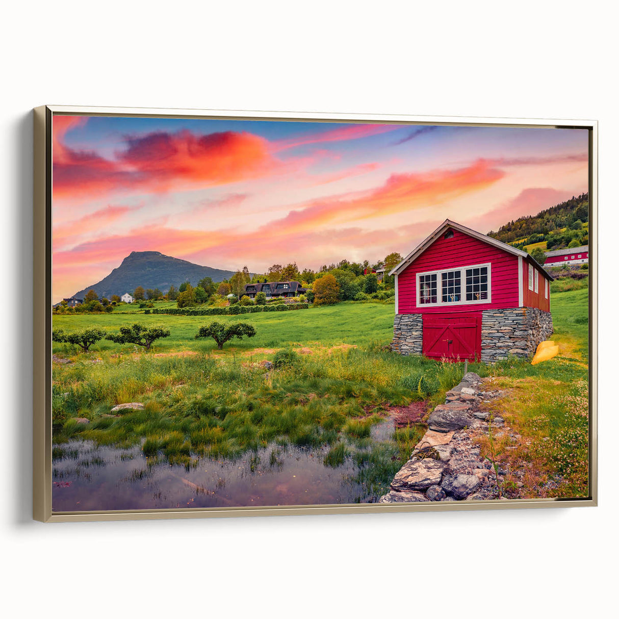 Framed canvas of a vintage landscape painting featuring black architectural houses in muted earth tones.