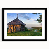 Extra large abstract art print featuring colorful, textured houses, on a black framed mat, ideal for living room decor.