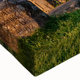 Large art of a black and white landscape painting on stretched canvas, featuring detailed houses.