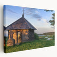 Architectural design of houses in muted earth tones on a stretched canvas, suitable for kitchen wall art.