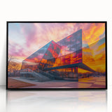 Large abstract wall art featuring geometric shapes in muted earth tones, framed in black acrylic.