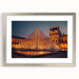 Textured abstract art print in silver frame, featuring swirling gray and white patterns, ideal for bedroom decor.
