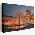 Large abstract painting on stretched canvas featuring bold geometric shapes in blue and orange.