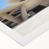 Art deco poster featuring a geometric and symmetrical building design in muted beige and brown, printed on rolled canvas.