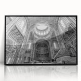 Large abstract wall art featuring geometric shapes in muted earth tones, framed in black acrylic.