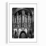 Abstract art prints featuring geometric shapes in muted gray and blue tones on a framed canvas, ideal for dining room decor.