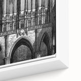 Framed canvas depicting vintage poster art of a black and white landscape, ideal for bedroom wall art.