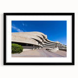 Extra large abstract art print featuring vibrant, colorful textures on a framed black canvas, ideal for living room decor.