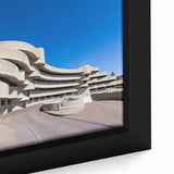 Extra large framed canvas featuring a black textured background with vibrant, colorful abstract designs.