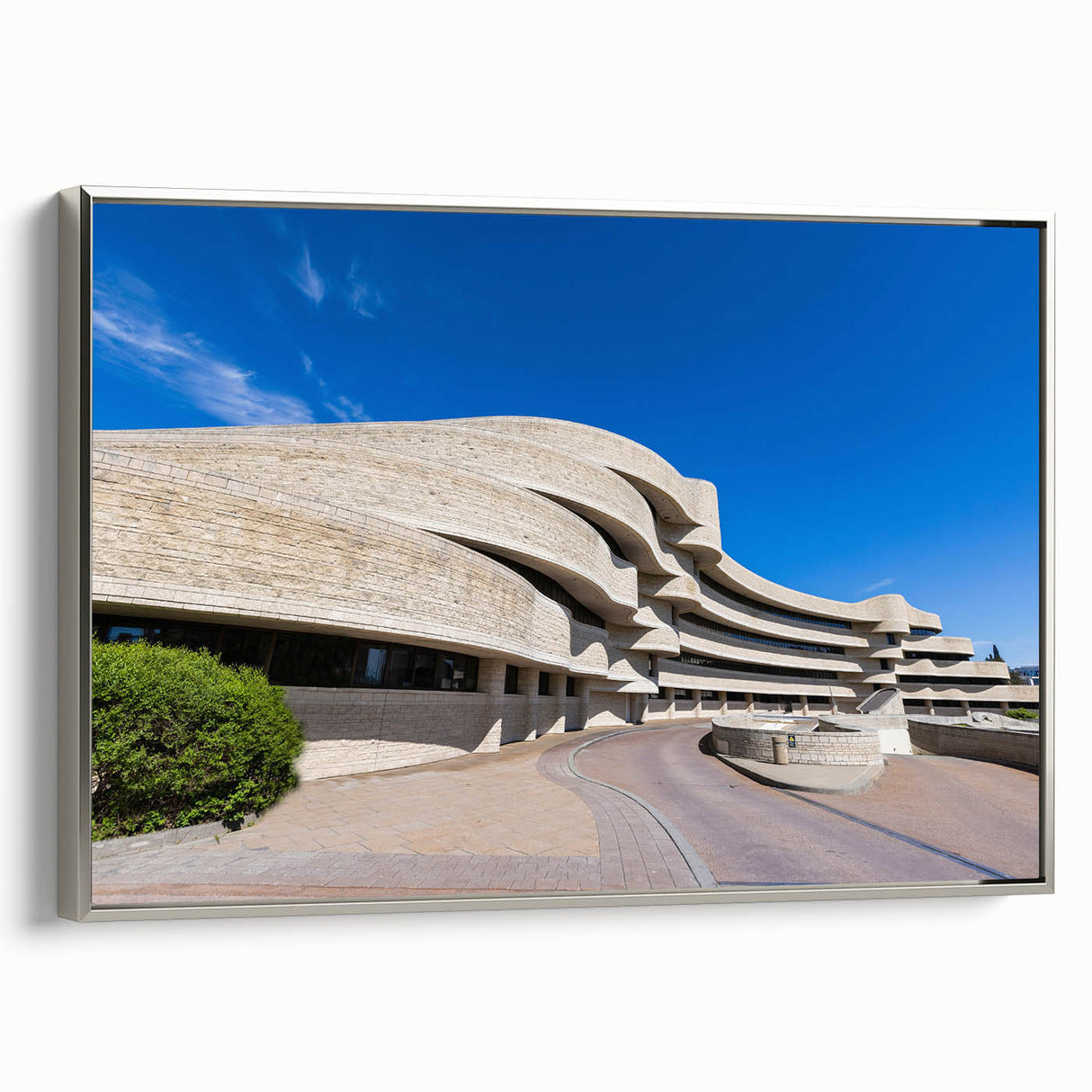 Framed landscape art painting featuring a vintage poster design in black with colorful accents, ideal for office decor.