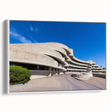 Vintage poster art of colorful architectural museums on a large framed canvas, ideal for living room decor.