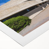 Art deco poster featuring symmetrical geometric patterns in gold and black on rolled canvas, suitable for dining room decor.