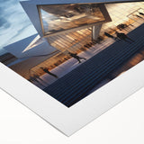 Art deco poster featuring a geometric design in muted gold and navy, printed on rolled canvas.