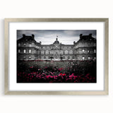 Abstract art print featuring a geometric design in muted gray and silver tones, framed with a silver mat.