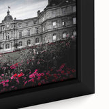 Close-up of a black wall art canvas featuring a colorful, textured abstract design, ideal for living room decor.