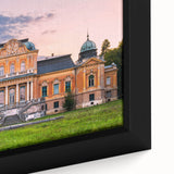 Close-up of a black wall art featuring a textured palace architecture design in vibrant colors on a framed canvas.