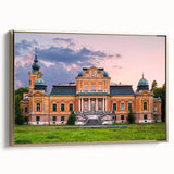 Framed canvas featuring a vintage poster art of a palace landscape in muted gold and black tones.