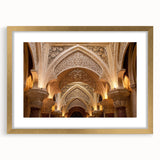 Textured abstract art print of an architectural palace, in muted gold and beige tones, framed with a gold mat.
