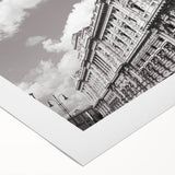 Art deco poster of a palace, featuring geometric patterns in gold and black on rolled canvas, suitable for dining room decor.