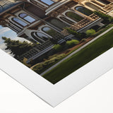 Art Deco poster featuring a symmetrical palace design in muted gold and white tones on rolled canvas.