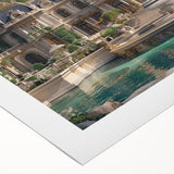 Art deco poster featuring a detailed palace design in muted gold and black on a rolled canvas.