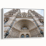 Framed canvas featuring a vintage-style landscape painting with predominant black and muted tones.