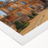 Art Deco poster of a palace, featuring geometric patterns in gold and black on rolled canvas, suitable for dining room decor.