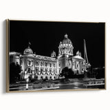 Framed canvas featuring a vintage landscape art painting of a palace with gold and black tones.